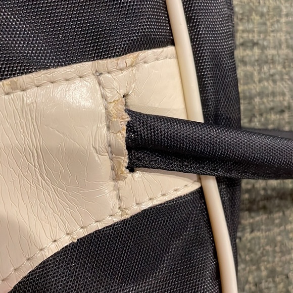 Puma black and cream colored fabric purse. - Picture 5 of 9